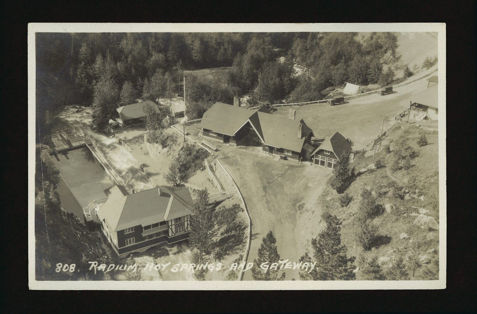 On Back: Along the Line of the Canadian Pacific Railway. On Back: Made in Canada On Front: [printer's no.] 808 Description: Bird's eye view of Radium Hot Spring