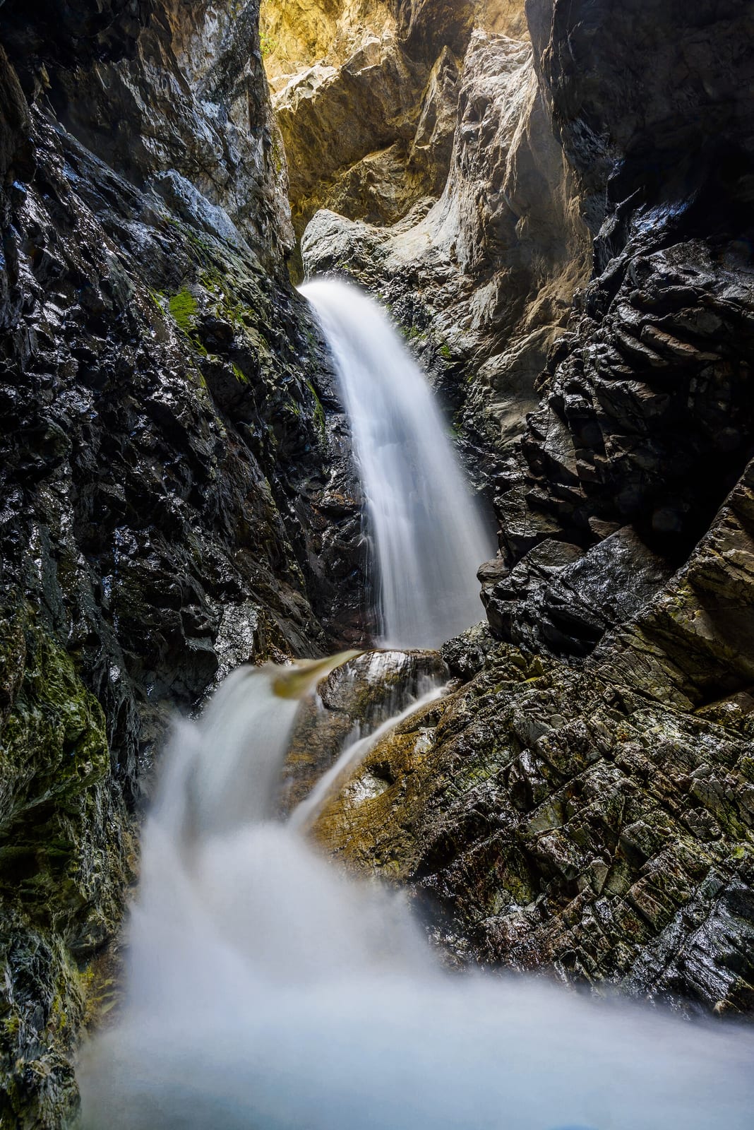Zapata Falls in its narrow rock crevasse