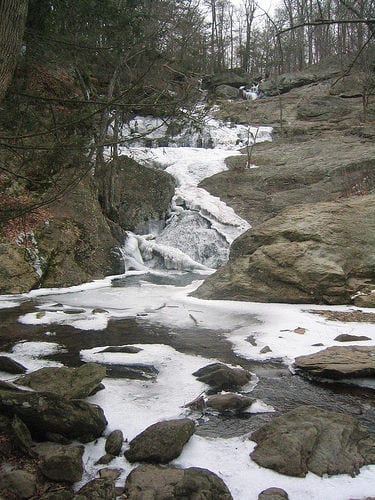 Cunningham Falls, in Maryland's Cunningham Falls State Park, is partially frozen on a cold February afternoon.