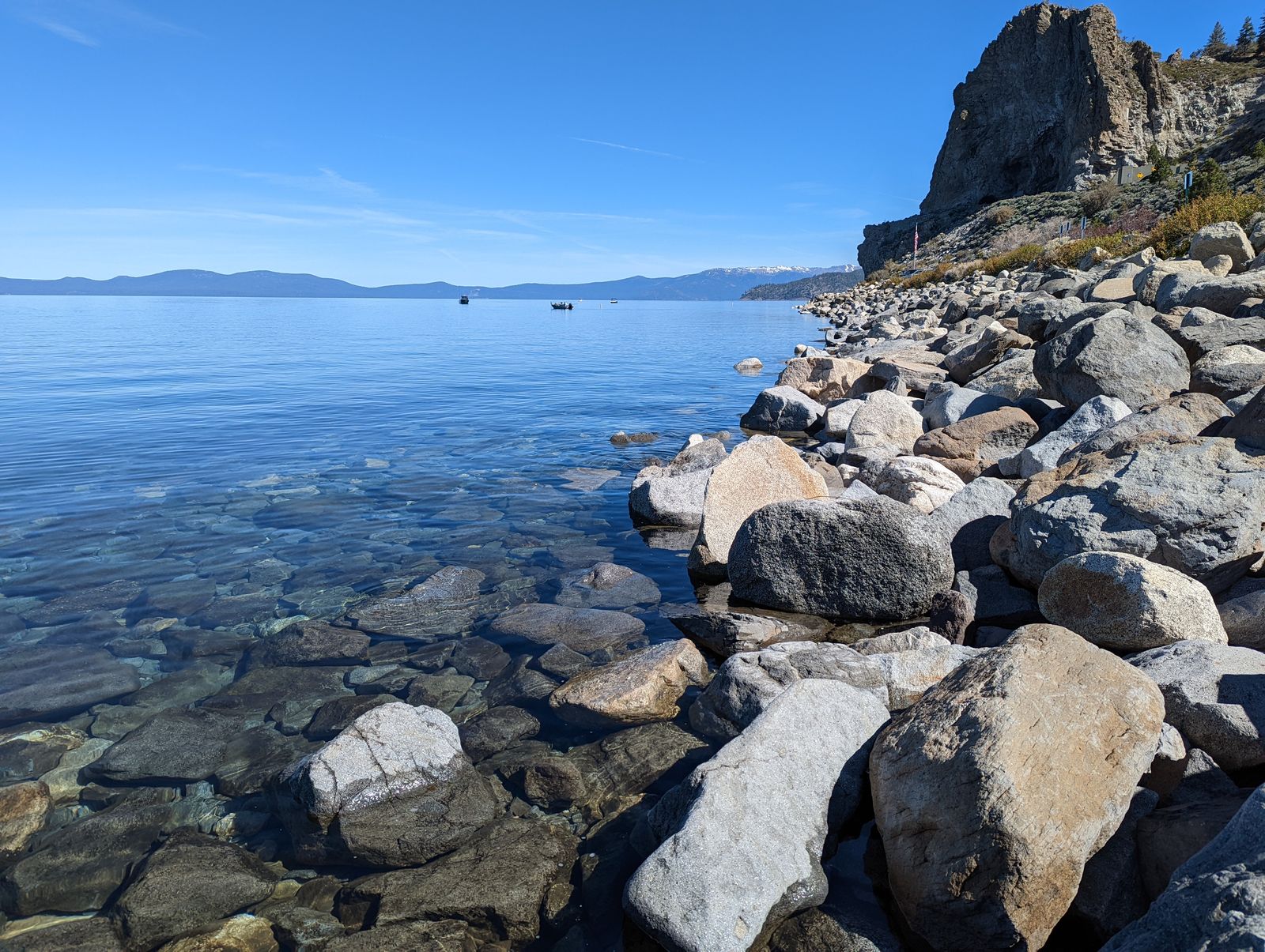 Rocky shoreline and clear water below Cave Rock on Lake Tahoe