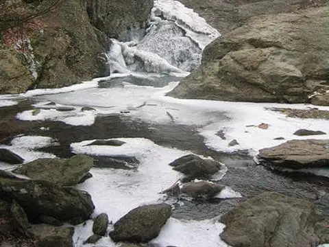 Cunningham Falls, in Maryland's Cunningham Falls State Park, is partially frozen on a cold February afternoon.