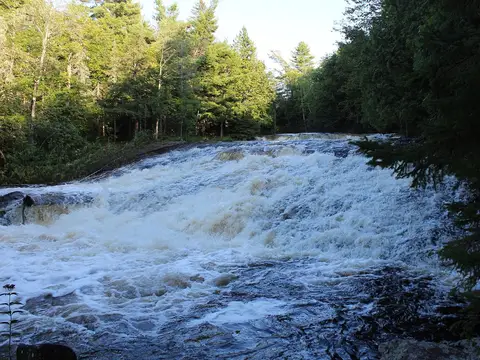 Upper falls / rapids upstream (south) of the main falls of Bond Falls on the Ontonagon River.