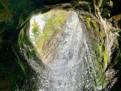 Donut Falls plunging through rock in Big Cottonwood Canyon